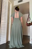 I ordered as a bridesmaid's dress for my friend's wedding, I loved it! I initially ordered a L but exchanged for an M, it fit great. Very flattering on the top, and I love the color. I did have to get it altered because of the length. - Natalie W.