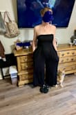 Ordered this May 23rd and it never came. I ended up ordering again, and this time it was delivered and I'm so happy with it. It feels like flowy bathing suit material imo. It's very light and airy! Very stretchy and forgiving so buyyy it! The top part stays put and I'm average chest size. It's very flattering. I'm almost 5'8 and it pretty much hits at the ankle to my ankle. Now all I need is a tan! - Jennifer H.