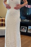 This dress was very high quality, the zipper was a little tricky with the beading but was absolutely stunning. The detailing was very pretty and the fit was great. The straps were very thin and the weight of the dress was a bit heavy (but all beaded dresses are a little heavy). - Jamie C.