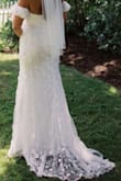 This dress was perfect and affordable. Wedding guests couldn't believe it was less than $200! The details were fabulous. I'm still in shock! - Katie A.