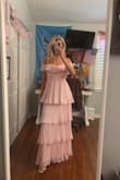 Omg I loved this dress! It was so beautiful. It was perfect for a wedding. The pink color is true to image and so beautiful. If you are smaller in the chest part, the part under the shoulder/chest ruffle is going to run pretty big. I had to wear a push up bra to fill the empty space, I would definitely size down, maybe even 2 sizes! But I got so many compliments! I loved this dress, it was beautiful! - Elisa P.