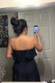 The dress is heavy! I had to pull it up every now and then throughout the night but it wasn't bad. It was a little big on me, but it's not stretchy so it was a good idea to size up! - Brittney H.