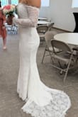 This dress fit me perfectly on my wedding day. I wanted something that was elegant and simple, and this dress did not disappoint. I had many compliments on my dress and felt beautiful walking down the aisle. - Andrea H.