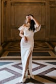 This dress is gorgeous! XS fits perfectly on my slim petite body type. It's quite tight thick fabric but you will look good on it. Does not feel cheap at all. I got A LOT of compliments from strangers on the street when my husband and I did the elopement. Highly recommend!!! - Ivalyn P.
