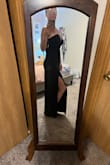 This dress is ABSOLUTELY gorgeous, and fits true to size. It has some stretch but it's minimal. I was able to find the perfect strapless bra from VS that works well with the low cut front. I feel downright gorgeous and sexy while wearing this. Granted, I've only tried it on - my event isn't until November 2025. But I know this dress will turn heads when I go out with my boyfriend.

The pictures I'm posting are not from the event, but from me just trying it on. I LOVE this dress. The slit is perfect - just enough to be sexy but not high enough to be slutty. - Whitney H.