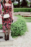 I was searching for a dress to wear as a wedding guest and am so happy I came across this! I'd say it fits true to size but, although there is ruching around the waist, it definitely is more on the form-fitting side. Dress had slit in the leg (left side) which I knew about but I guess went a little higher than I thought. Would purchase again! - Stephanie D.
