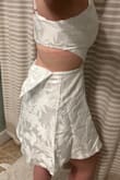 I'm a tall girl with curves, so it's always challenging to find a dress that is not too short or long on me (5'9, 46" hips, 33" waist, 36C chest). I should have ordered a Large instead of XL, but this dress is adjustable like a bra in the chest and VERY forgiving in the hip area, so I'm keeping it. Absolutely LOVE it - the bow on the back is adorable. It's perfect for our dinner party! - Morgan M.