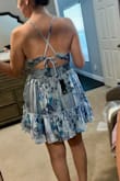 I like how the top fits and that the ties are adjustable. The back is flattering and not tight on back fat. However, the ruching along the waist looks so frumpy and poofy! Not flattering. 5'7, 160 lbs, ordered Large and borderline too short. - Amanda A.