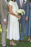 I wore this for my summer civil ceremony. It was beautiful and felt cool. The skirt has lovely flow and pockets, and the top accommodated my broad shoulders. I wore the top tucked into the skirt (short torso), and everyone thought it was a one-piece dress, but I'm so glad now I can wear each piece with different outfits. Only feedback is the pockets do show through the skirt a little bit, and it does need a good steam. - Maya C.