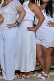 This dress is a showstopper! The white satin fabric flows beautifully, and the asymmetrical design adds a modern, elegant touch. It's incredibly flattering and perfect for special occasions. The quality is outstanding, and it pairs wonderfully with heels. Highly recommend for anyone wanting a chic, sophisticated look! - Ruth W.