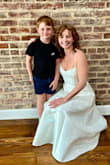 I wore this beautiful dress for my bridal shower. This dress is absolutely stunning and fits beautifully true to size with a flattering silhouette. The material feels high-quality, with an elegant, classy drape that moves with sophistication. I received so many compliments when I wore it! I styled it with statement earrings and heels to elevate the look even further. One of my favorite features? It has pockets, such a thoughtful and practical touch! It did arrive with a few wrinkles from shipping, but a quick press with an iron smoothed everything out perfectly. I highly recommend this dress; it's both timeless and versatile. - Alina K.