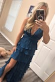 Beautiful dress! Received so many compliments! The only downside was that it was long, even with some good heels, but I am very short (5'0). Other than that, it was perfect! - Alyson P.