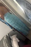 The quality of the dress is nice, and I liked the style. I would say it looked a little brighter in person. Also, it fits a little big on the sides for me, but it seems to be a size small. I wish they offered it in an extra small. - Shayla P.