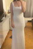 This dress fits great, is not see-through. I did return it because I decided to wanted a poofy wedding dress. I got size Medium, and I am usually a size 6-8. I do have a bigger bottom and thighs, and it was a little tight but wearable. I am 5'6, and the length is perfect for that height if I were wearing flats or maybe a 1 inch heel! - Shanon S.