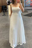 I got it for my engagement party. I have a smaller waist and bigger hips. It complemented my body type. It's a really cute simple dress. It was a little bit long, but I wore it with heels. That's why I didn't have to shorten it. The material is really nice too. It could easily be a wedding dress with a veil. My only issue was the stitches around bust- they were not the best. I usually wear S or M. It didn't break the bank and was a good dress. - Bengisu T.