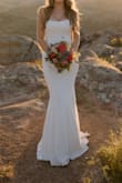 My husband and I did a simple backyard ceremony, but I wanted something to wear for photos that did not look cheap but also did not want to spend $1000+. The dress fit perfect and was very flattering on. Would repurchase. - Shavonne M.