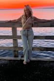 I love this top. I ordered in a small so it would fit snug but it was way too small. I exchanged for a medium and it fit perfect! It is lined and feels like good quality! - Jessica L.
