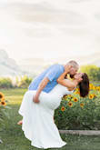 I bought this dress for our engagement photos, and it was perfect! Very comfortable with some stretch and very well made. The length was also just what I wanted, even without wearing heels. If I were going to get married in the summer, on the beach, I would even consider this being my dress. - Ashley L.