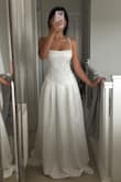 I love this dress! I'm a bit short so the dress is long for me. I'll get it altered though. The quality is amazing, I would definitely need help putting the dress on though, since I want the back to be perfectly aligned. I'm super excited to wear it for my wedding day! - Annabelle A.