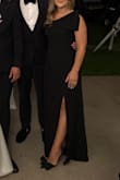 I felt great in the dress. I had it altered for length and stitched it in just a little up top. The bow was also stitched to lie fanned out. I received many compliments, and I felt great. The dress was perfect for the black-tie wedding. - Nadia S.