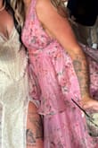 This dress was perfect! I loved the layers and how it laid. Plus, I got tons of compliments all night. I did have to pin it by the armpits because it poked out, and I didn't have time to get it hemmed (see second pic). It wasn't noticeable when my arms were down. I could have gone down a size to a Large, but still glad I didn't. I bet if I went down a size, it would have fit in the chest, but I'd take overall comfort! I also used boob tape. Definitely a great dress to keep in my closet. - Jessie F.