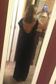 I bought this to wear during an upcoming vacation and thought a jumpsuit would be fun and edgy.  This piece caught my eye immediately with the open back and ruffle.  When it arrived I tried it on and was delighted to find the legs were long enough and the fit was easy, comfortable and true to size.  It can be challenging to find the right fit in all dimensions with a jumpsuit but this piece nails it in every area.  Very classy! - AMY O.