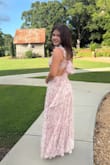 Beautiful pink toile dress. I did have to alter the straps (they were too long, even on the tightest setting) and hem the bottom as the dress was too long even with 3-inch heels. However, it was beautiful after these alterations! - Natalie N.