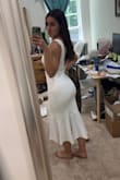 SO pleased with this purchase. It's exactly what I expected. Hugs very nicely, super flattering. The liner inside is thick enough that it's not see-through, which is great. I'm wearing sticky boobs with it. I love the length and the square neck. I'm planning to wear this for my wedding rehearsal dinner. - Jillian P.