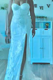 Initially, I was nervous that this dress would be too revealing, but I absolutely love it (plus I'm 50 years old, and having a beach ceremony so it doesn't matter). It fit perfectly with no issues. The length works great with and without shoes. The lace is very pretty and has some shiny bits. I tried on several dresses at bridal salons and didn't really like anything or have that bridal moment. This dress gave me all the feels. - Patricia A.
