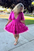 The dress is super cute, fun, and fits true to size. The material is light, perfect, and flowing. I love it. - Patricia O.