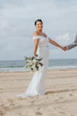 I absolutely loved this dress for my wedding.  I received so many compliments.  Everyone said the dress fit me like a glove, like it was made for me. I did have it hemmed due to my height, I'm 5'2". I added a belt for the perfect sling accessory. - Mary F.