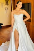 I am absolutely thrilled with my wedding dress! Ordering online can feel like a gamble, but this dress exceeded all my expectations. The fit is truly beautiful...it felt like it was made for me. The silhouette is so modern and chic, exactly what I was hoping for. And the quality of the materials is excellent; the fabric feels luxurious and well-made. I can't wait to wear this on my big day. Highly recommend! - Luisa A.