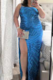 Me encantó el vestido, la talla corresponde con mis medidas, me quedó un poco largo porque soy de baja estatura pero lo compensé con unos tacones altos. Es tal cual como en la foto. Lo recomiendo.

Translates To: I loved the dress. The size was true to size. It was a little long on me because I'm short, but I made up for it with some high heels. It's exactly as pictured. I recommend it. - Isabel M.