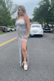 This dress is so perfectly fit and absolutely gorgeous. I got so many compliments the whole night. The slit comes at a perfect length the dress is long so you may have to get it altered but I wore big enough platforms to avoid that. - Valbona S.