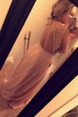 I am very pleased with this dress. I ordered a medium based off of the size measurement chart. I am really short so I will need to get it hemmed and altered slightly because my torso is shorter. I wish It had a built in bra but that could easily be put in when altered. It's a gorgeous well made dress! - Alexis A.