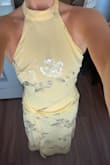 This dress was perfect for the Quinceañera we attended! The fabric is beautiful, and it is lined, so I did not have to wear a bra, which was a plus because the open back is so gorgeous! I possibly could have ordered the XS with my frame, but I had the top taken in a little bit, and it fit so much better! It was long for my height, but nothing some platform high heels can't fix! - Emily M.