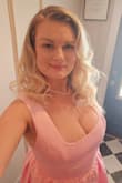I wore this for Easter and got lots of compliments! It's true to size. Fits my larger bust perfectly, and the bubble skirt wasn't too much like I thought it was going to be! - Heather M.