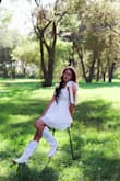 I wore this white dress for my senior pictures, and I couldn't have picked a better outfit! It was simple yet stunning. The fit was flattering in all the right places, and the fabric felt soft yet structured, perfect for staying comfortable during my photoshoot. What really stood out was the attention to detail; the stitching was clean, and it had just the right amount of flow. Whether you're wearing it to a summer party, brunch, or something more formal, you can dress it up with a classy pair of heels, or dress it down. Highly recommend if you're looking for a white dress that makes you feel effortlessly chic. - Adriana K.