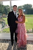 The top of the dress was a little tight. I'm a 34 C. I wouldn't change the size. If I ended up getting a size medium, it would be too big. I got so many compliments on the dress. It was very comfortable, and it's a perfect dress for an event. - Amber A.