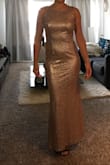 The dress is beautiful and so is the material but I have long torso and the curve the dress has doesn't fit well on me. I recommend it if you are shorter than me. - Barbara A.