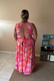 I purchased this dress to wear to our annual work party. The theme was fancy luau, and this dress was perfect! Light and airy. Love the adjustable open back. Vibrant, beautiful colors and design. - Stephanie G.