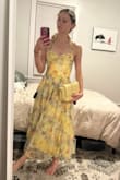 I'm in love with this dress! I was a bit nervous because it didn't have any reviews, but it's exactly as pictured. I'm usually a size small, and the small fits like a glove. It's perfect for the garden wedding I bought it for. I originally bought the butter yellow purse that was recommended to go with it, but the yellow on yellow ended up being too much. I will be going with a dark burgundy purse instead, which adds a nice pop of color against the beautiful yellow.
I bought a few other dresses in case this one didn't work, but this one was my favorite! - Jessica K.