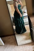 This dress looked great on the model but not amazing on me! My girls were busting out over the top of the cups and the waist felt a little tight even though I sized up and got an XL. The ruffles were also a little puffy at the sides. - Megan H.