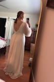 Man this dress is titty city on me! I wasn't wanting to show quite this much cleavage on my wedding day so I will be retuning it. But love the back, fits wonderfully and it does fall really nicely. Better for smaller chested women unless you are comfortable with cleavage! Long but I'm short, sleeves were a bit long too but over all a nice dress really do like it. - Amanda C.