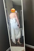 Bought this dress for an elopement. It fits perfectly and is made out of a heavy and thick material that add elegance and comfort to the piece. I LOVE the bow in the back. Well worth the price. - Grace S.