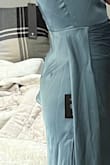 This dress was absolutely perfect... until I looked at the back. The cut, the fit, the color, just gorgeous. I thought I had found a winner. But as I now see a few other reviewers pointed out, the seam on the back side where the zipper is sticks out in a very ... **awkward** place. I tried steaming it and that helped but it didn't go away completely. Taking it to a tailor would put me over budget and probably cost the same as the dress if not more to re-do the zipper. I cannot overstate how utterly bummed out I am about this. I hope Lulus fixes this, because if I ever find out they do I will immediately repurchase. - Shannon B.