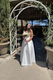 Absolutely in love with this dress! The minimalist design was elegant and timeless, and it fit like a dream. I felt so comfortable and confident wearing it - truly the perfect choice for my wedding day. I couldn't be happier! - Lisleth B.