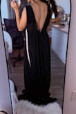 As a petite girlie, I was SWALLOWED by this dress. The fabric is ok (expected at this $99 price point) and looks a bit cheap, but there is SO MUCH of it! The dress overtook my body. My boyfriend's comments were "you look like a character from a scary movie". Returned. - Angela L.