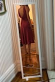 Beautiful dress and the material feels thick and durable for the price. The back is gorgeous. It's definitely low cut in the front so be sure to have some boob tape on hand to make sure no one gets a free show. I ended up going with a different dress but this was a close second and I may order again for something else. - Elizabeth E.