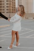 This dress is beautiful and a nice thick material. Highly recommend! The sleeves are a little long, but could be altered if someone wanted. - Katie P.